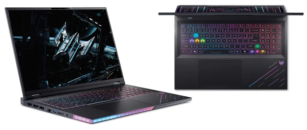 На картинке изображён игровой ноутбук с подсветкой и современным дизайном.